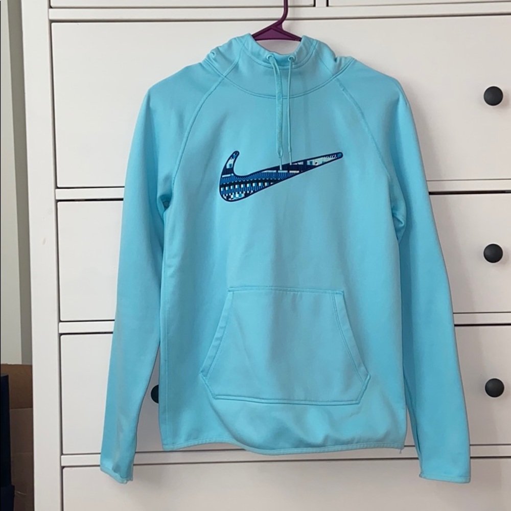 A Nike Therma fit blue hoodie